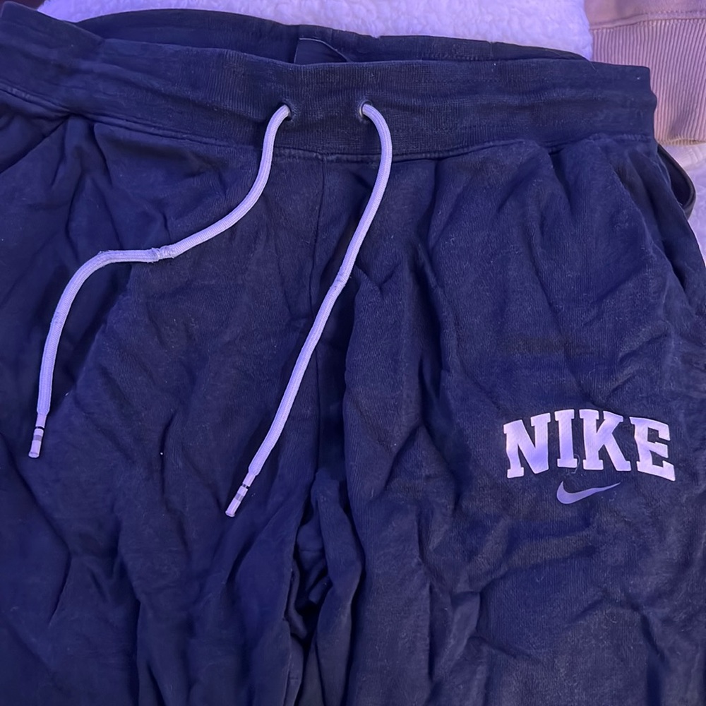 slightly worn Nike sweatpants